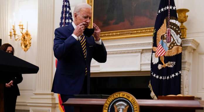 Biden says his mask mandate is common sense. Republicans say ‘kiss my ass.’