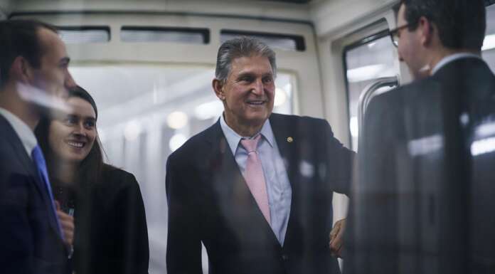 Manchin holds out until last minute on elections vote