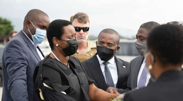 Haiti faces uncertain future as mourning first lady returns