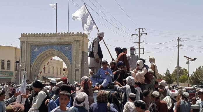 In the Taliban’s Birthplace, White Flags, Jailbreaks and Fears of Revenge