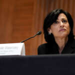 CDC director breaks with agency advisers to endorse Pfizer booster for at-risk workers