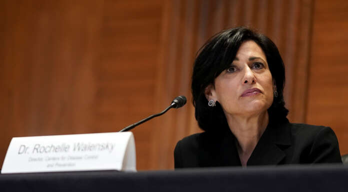 CDC director breaks with agency advisers to endorse Pfizer booster for at-risk workers