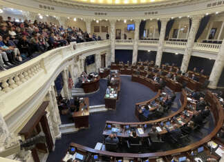 Idaho advances bill easing worker compensation for vaccine side effects, other COVID-related bills