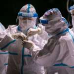 Fresh lockdowns in China as local Covid-19 infections spread to 11 provinces