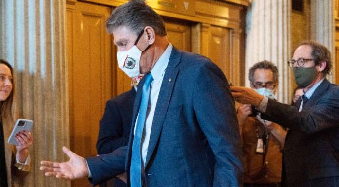 Manchin issues warning about rising inflation, as clock ticks on social spending bill