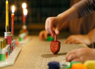 Hanukkah celebrations shine a light after a year of adversity