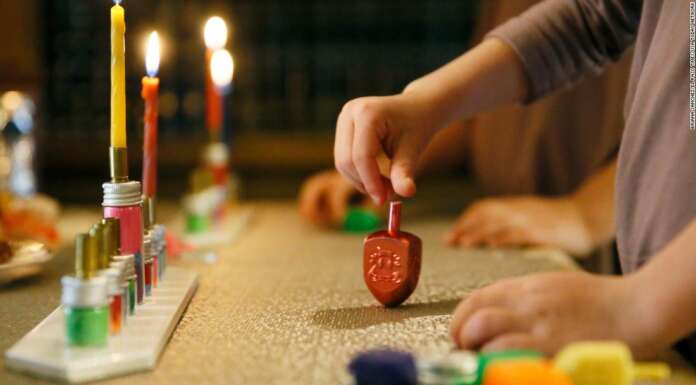 Hanukkah celebrations shine a light after a year of adversity