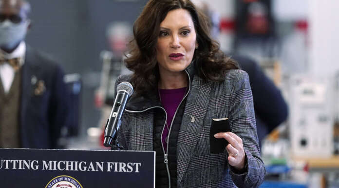 Michigan’s Whitmer isolating from husband after he tests positive for COVID-19