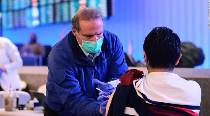 Flying home after the holidays? Getting vaccinated or boosted is the first step toward safe travel, expert says