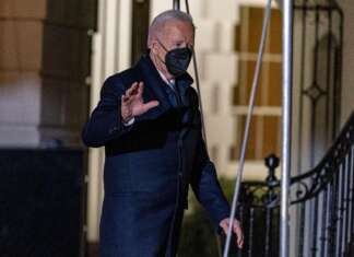 Biden Team Regroups After Court Loss On COVID Shots-or-test