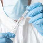 Mother Charged After Teen Son Found In Car Trunk At COVID Test Site