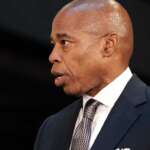 Adams defends ties to close friend with checkered past