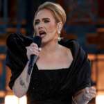 Tearful Adele announces postponement of Vegas residency day before premiere