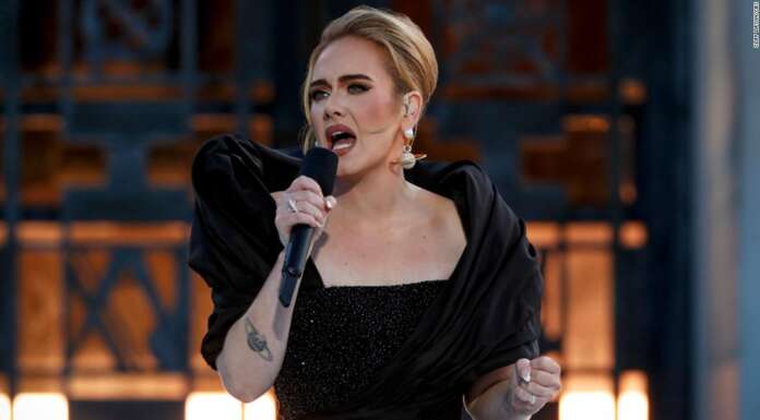 Tearful Adele announces postponement of Vegas residency day before premiere