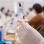 Austria signs into law strict Covid-19 vaccine mandate