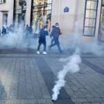 Paris Police Fire Tear Gas To Disperse Anti-Vax Mandate Protesters