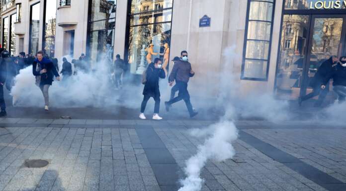 Paris Police Fire Tear Gas To Disperse Anti-Vax Mandate Protesters