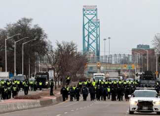 Vital US-Canadian border crossing reopens after trucker blockade cleared